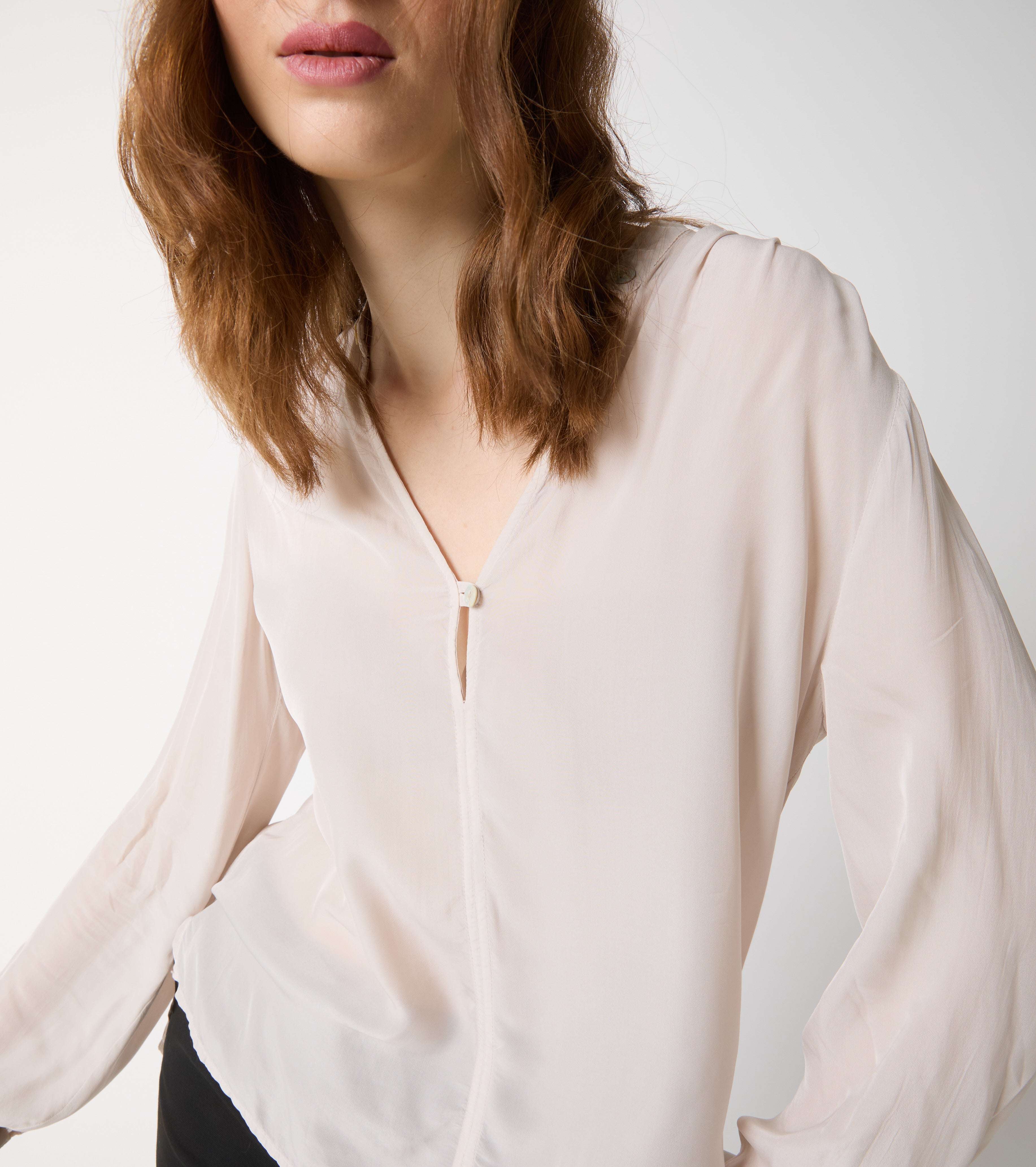 Blusa con scollo a V