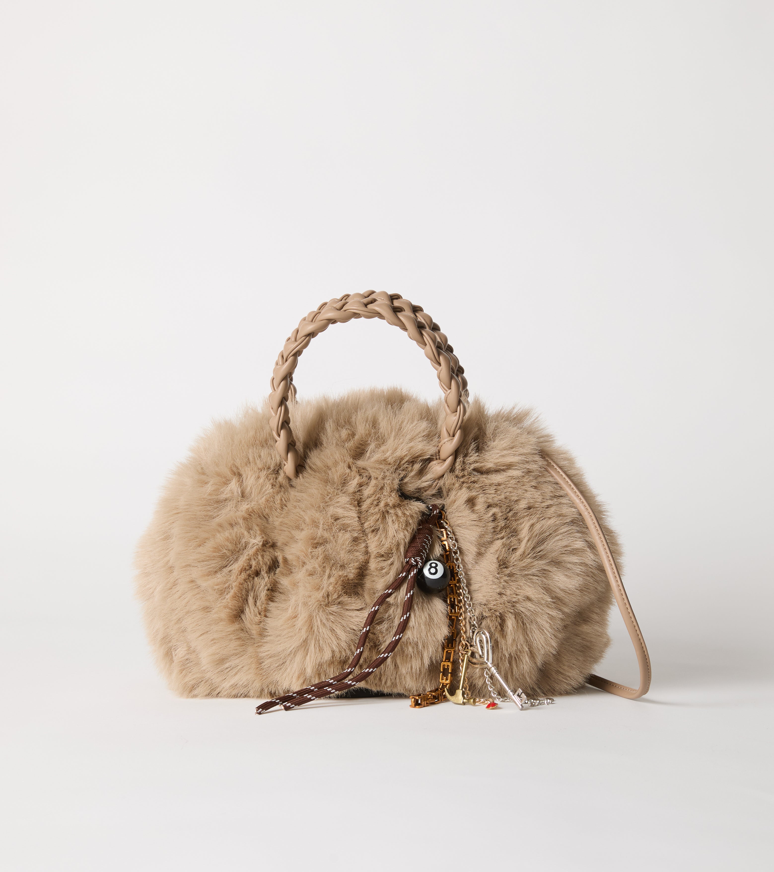 Faux fur bag with woven handles