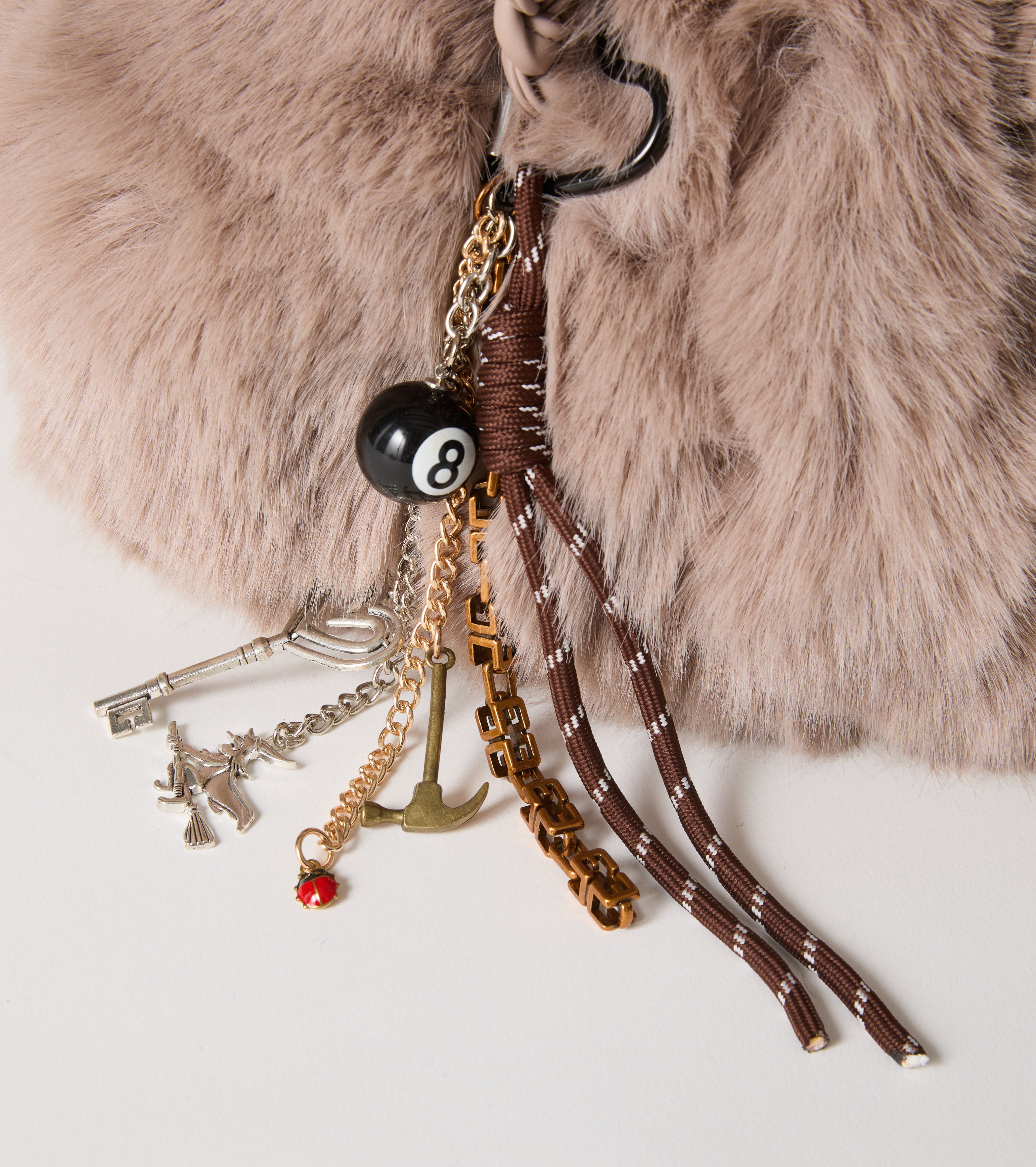 Faux fur bag with woven handles