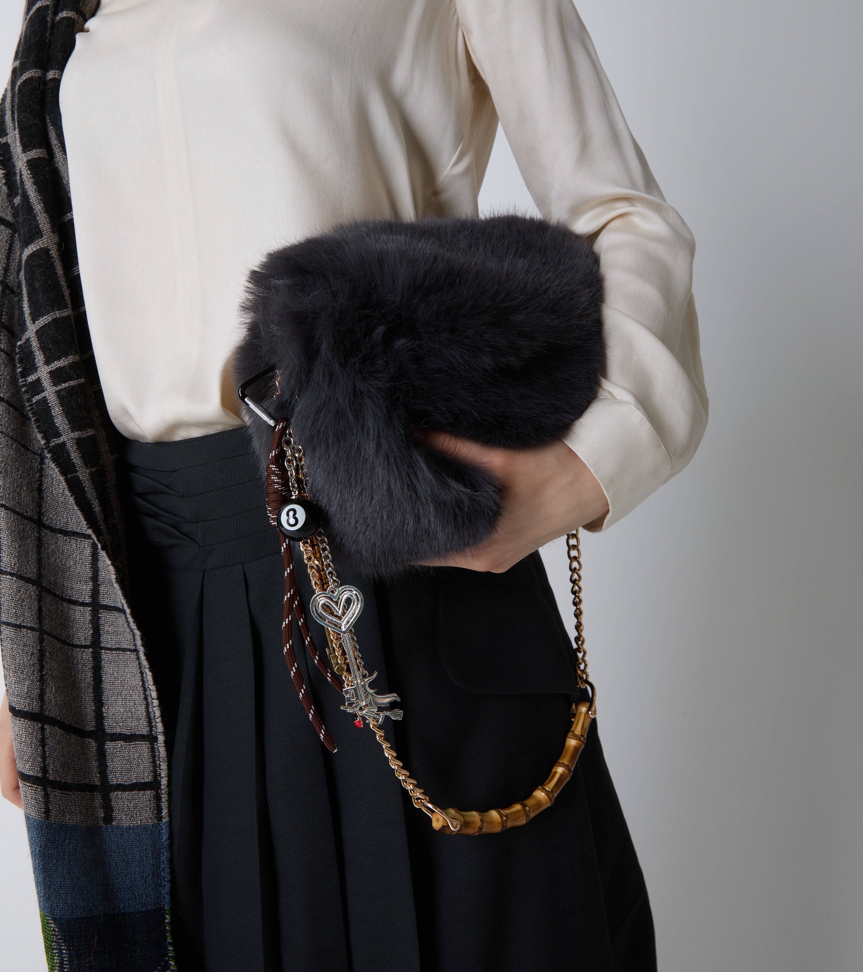 Faux fur crossbody bag with chain