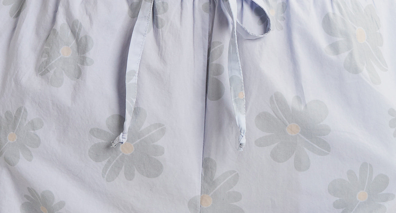 Cropped trousers with drawstring