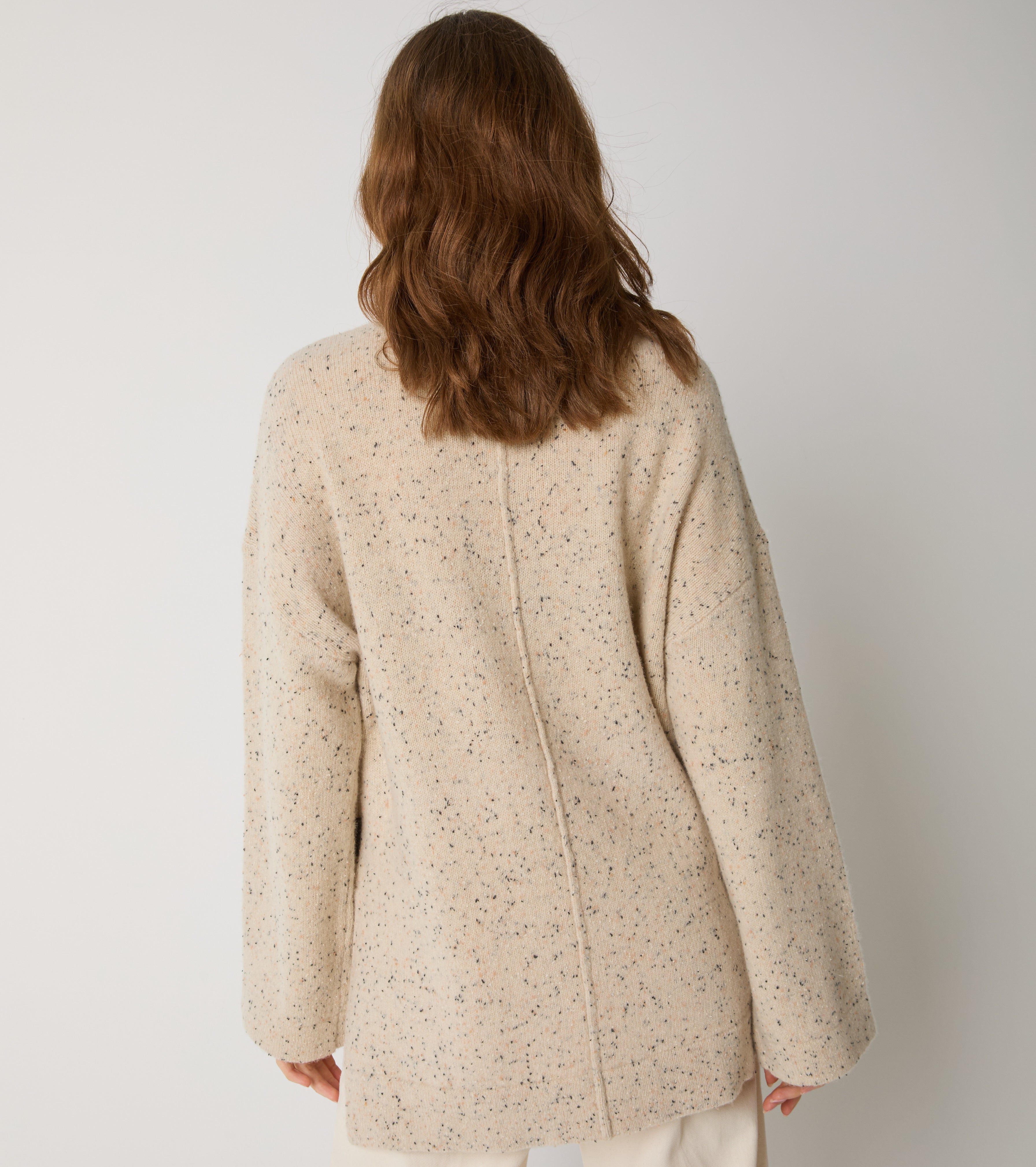 Maglia dolcevita in lana con spacchi