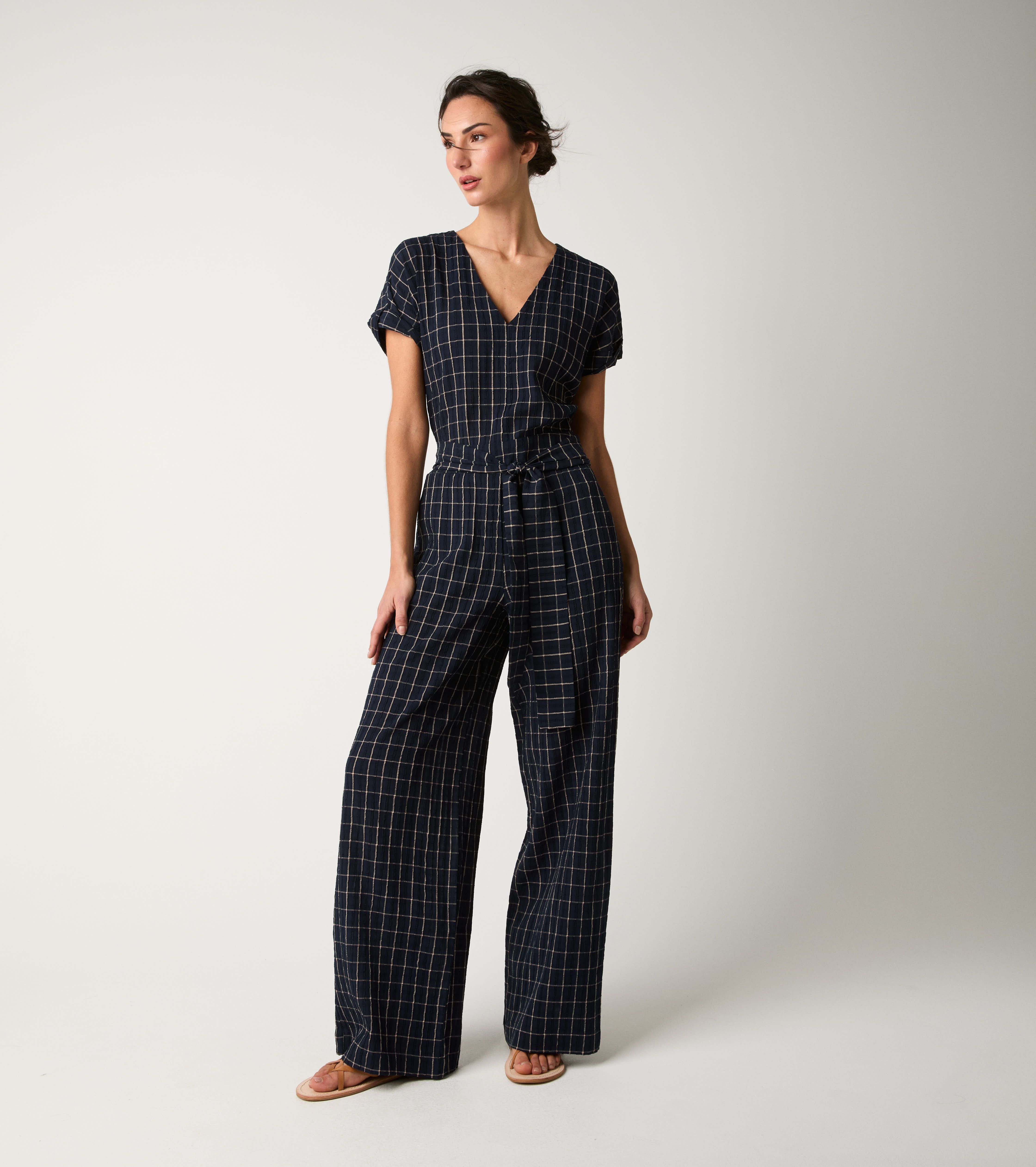 Tuta in cotone con motivo check e scollo a V blu