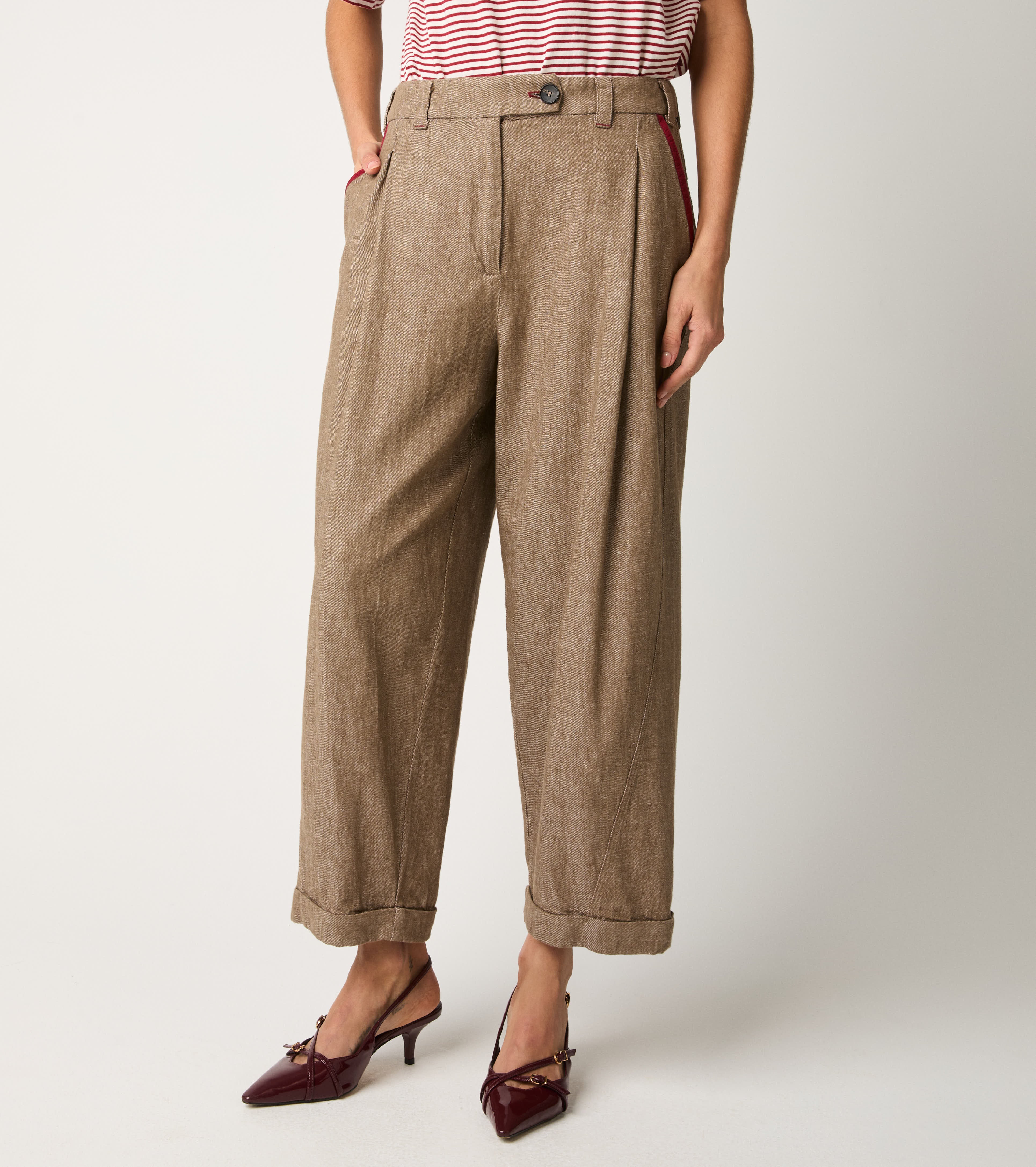 Trousers with darts and beaver lapels