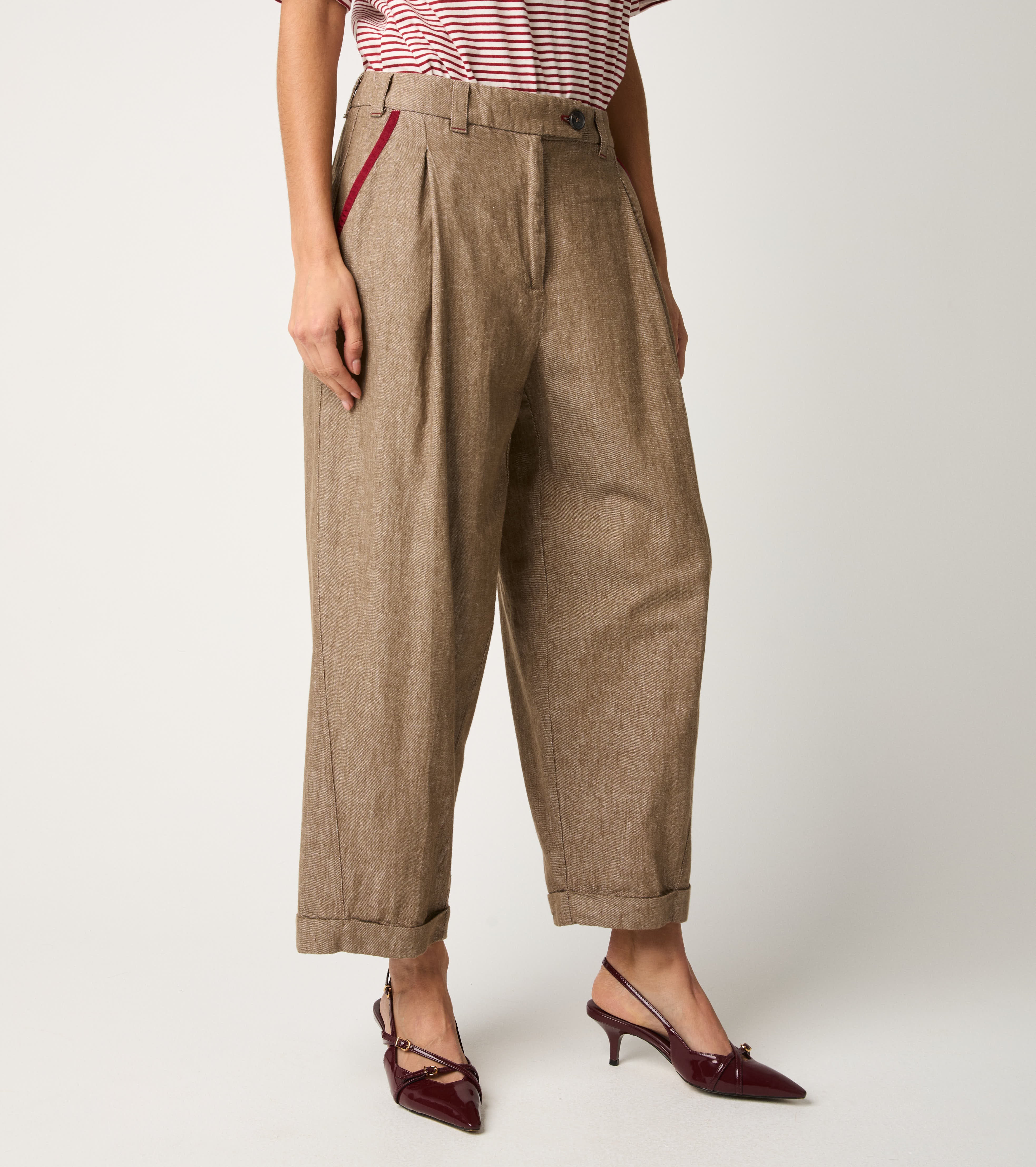 Trousers with darts and beaver lapels