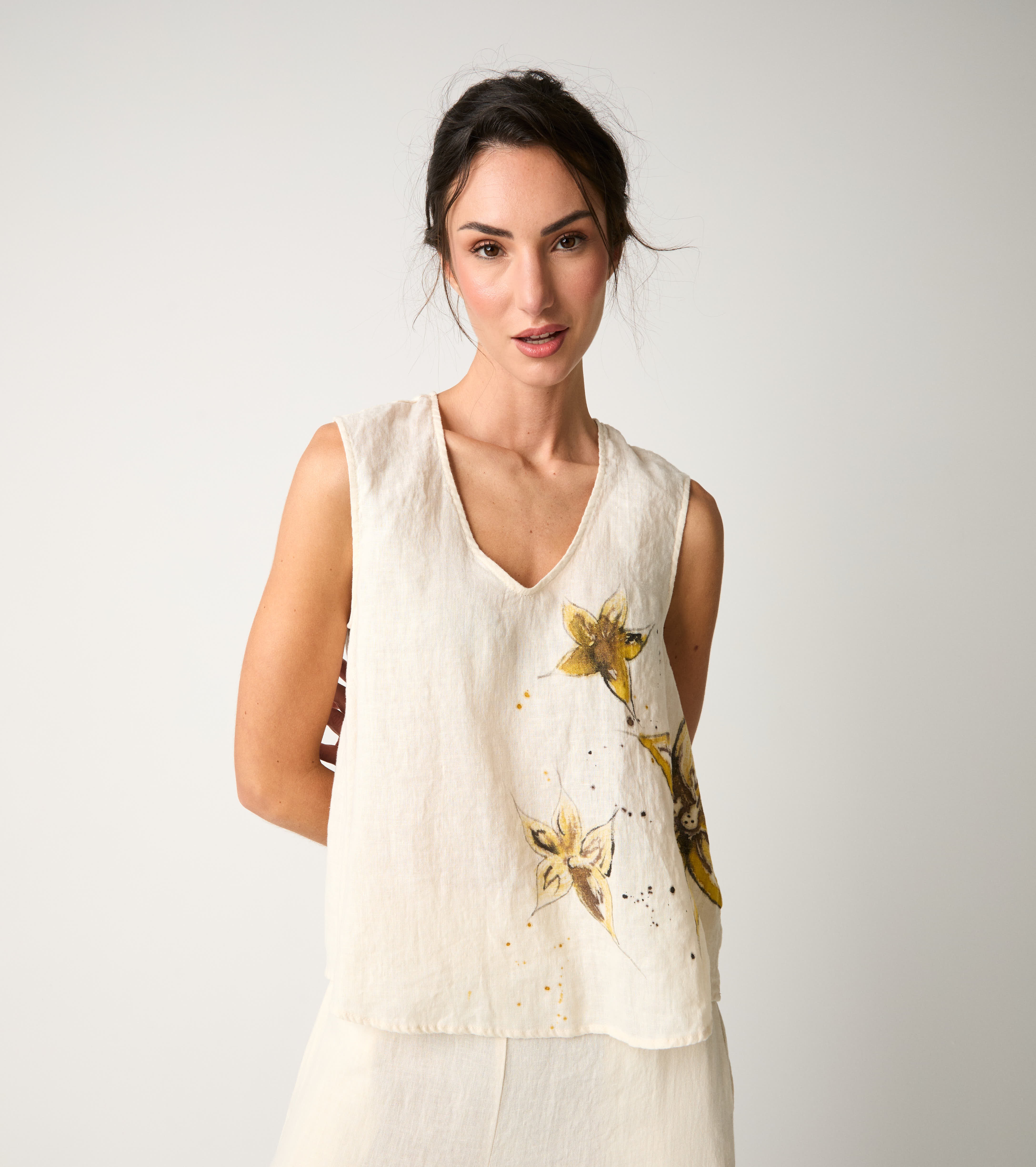 Top floreale con scollo a V fiori