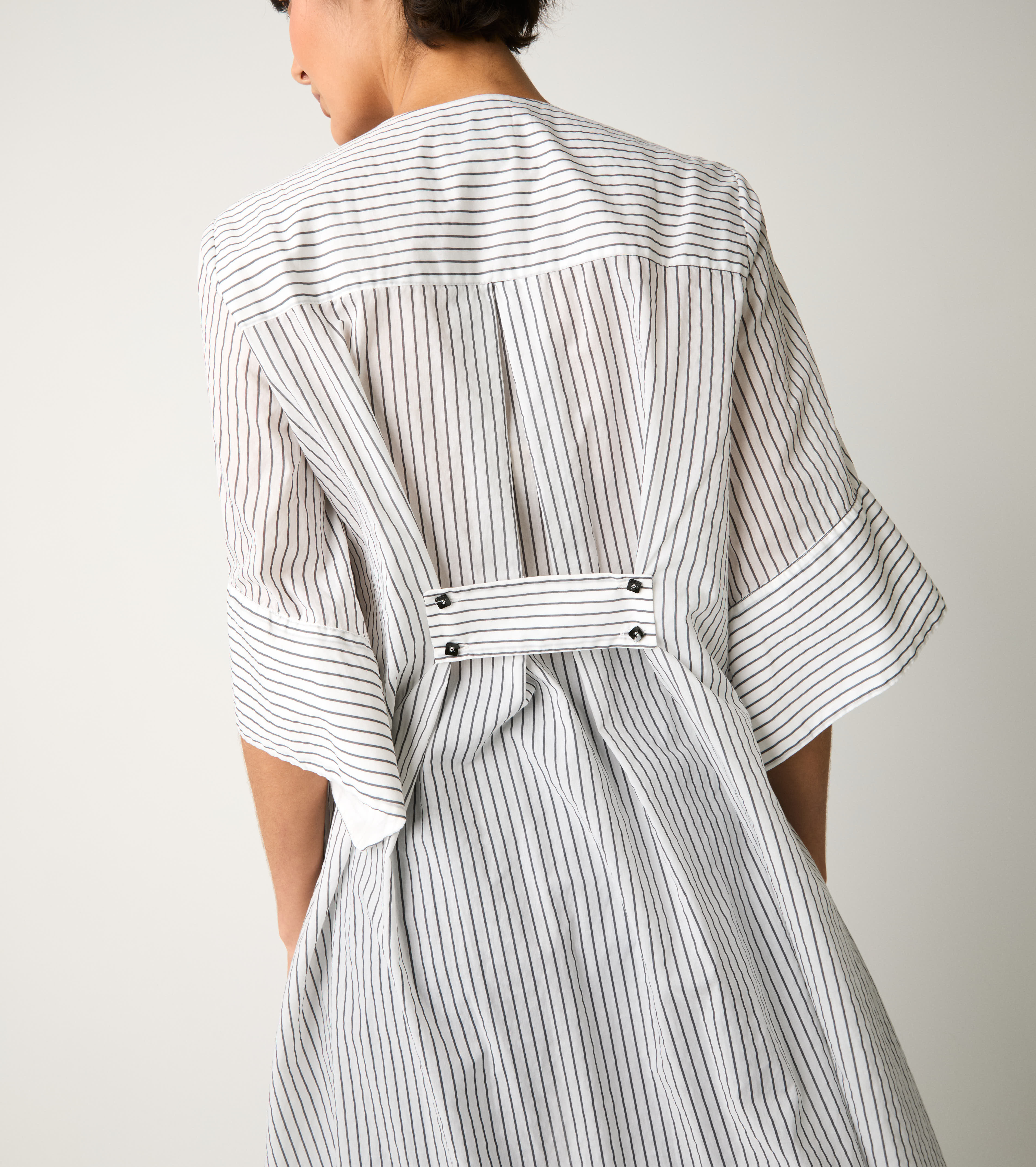 Long striped shirt with white slits