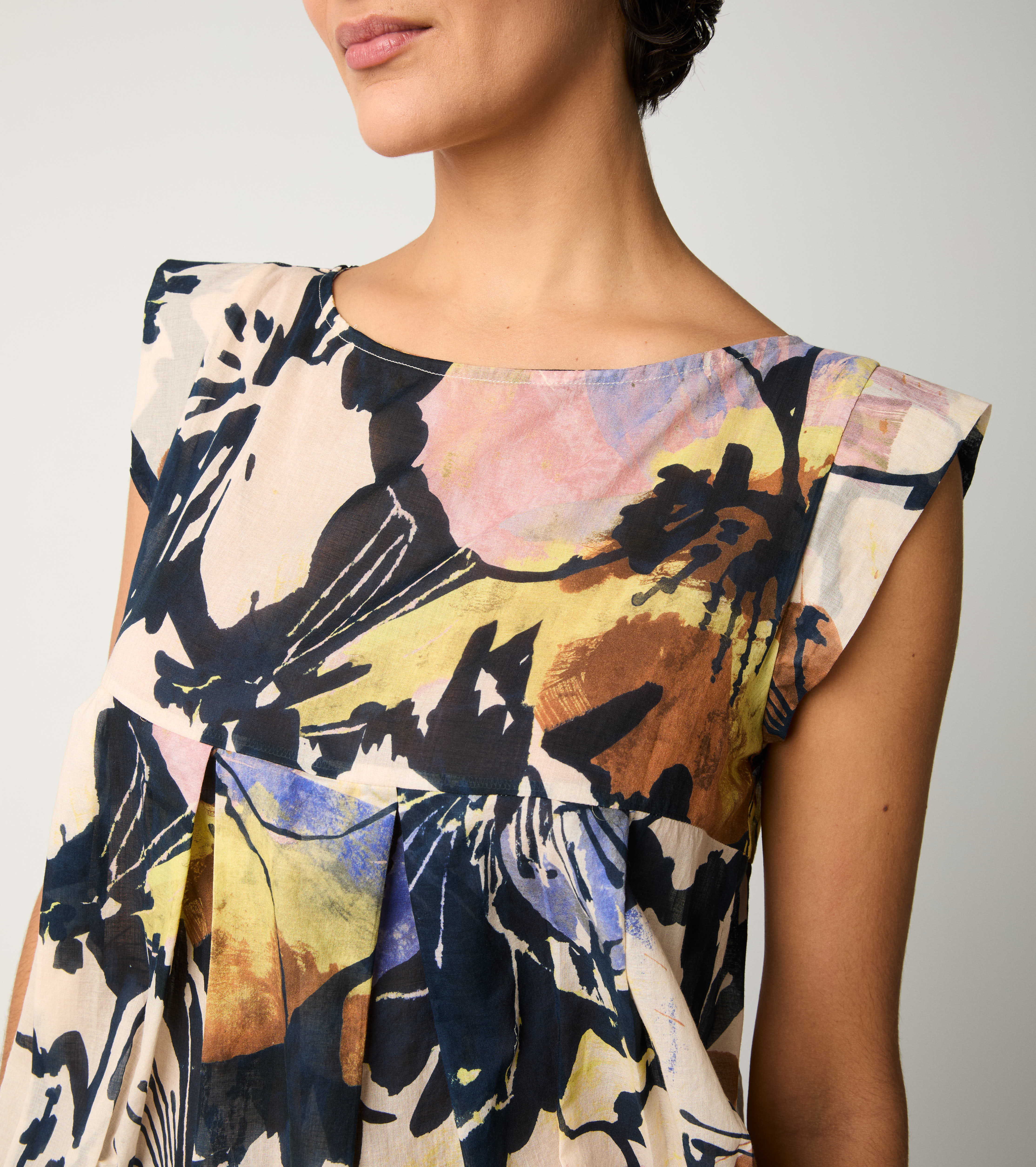 Top floreale con scollo a barca fiore