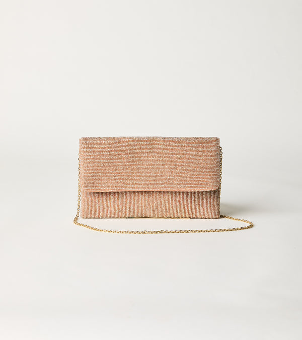 Borsa crossbody con catena e patta rosa