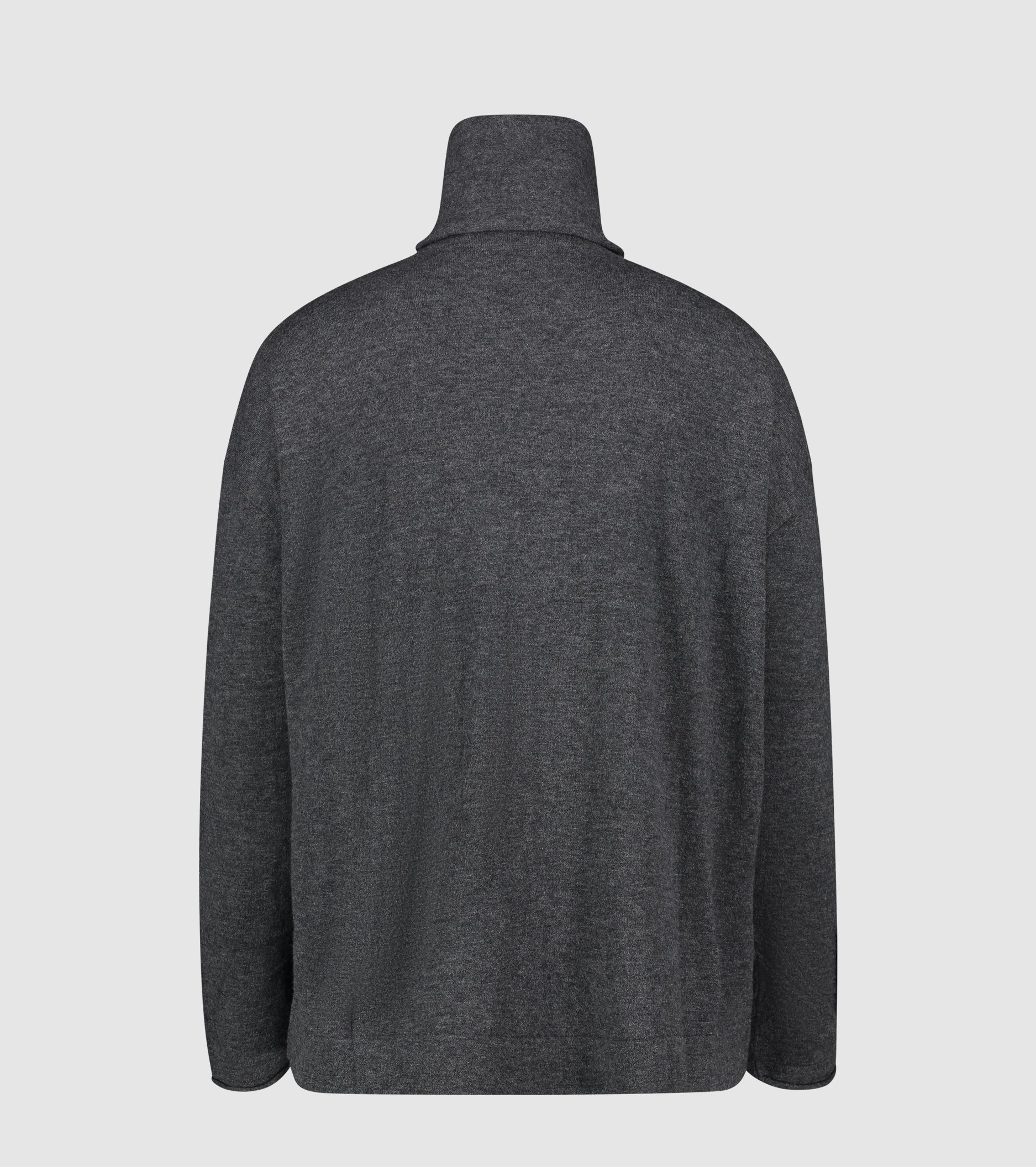 Suéter de cuello alto de lana con bolsillo