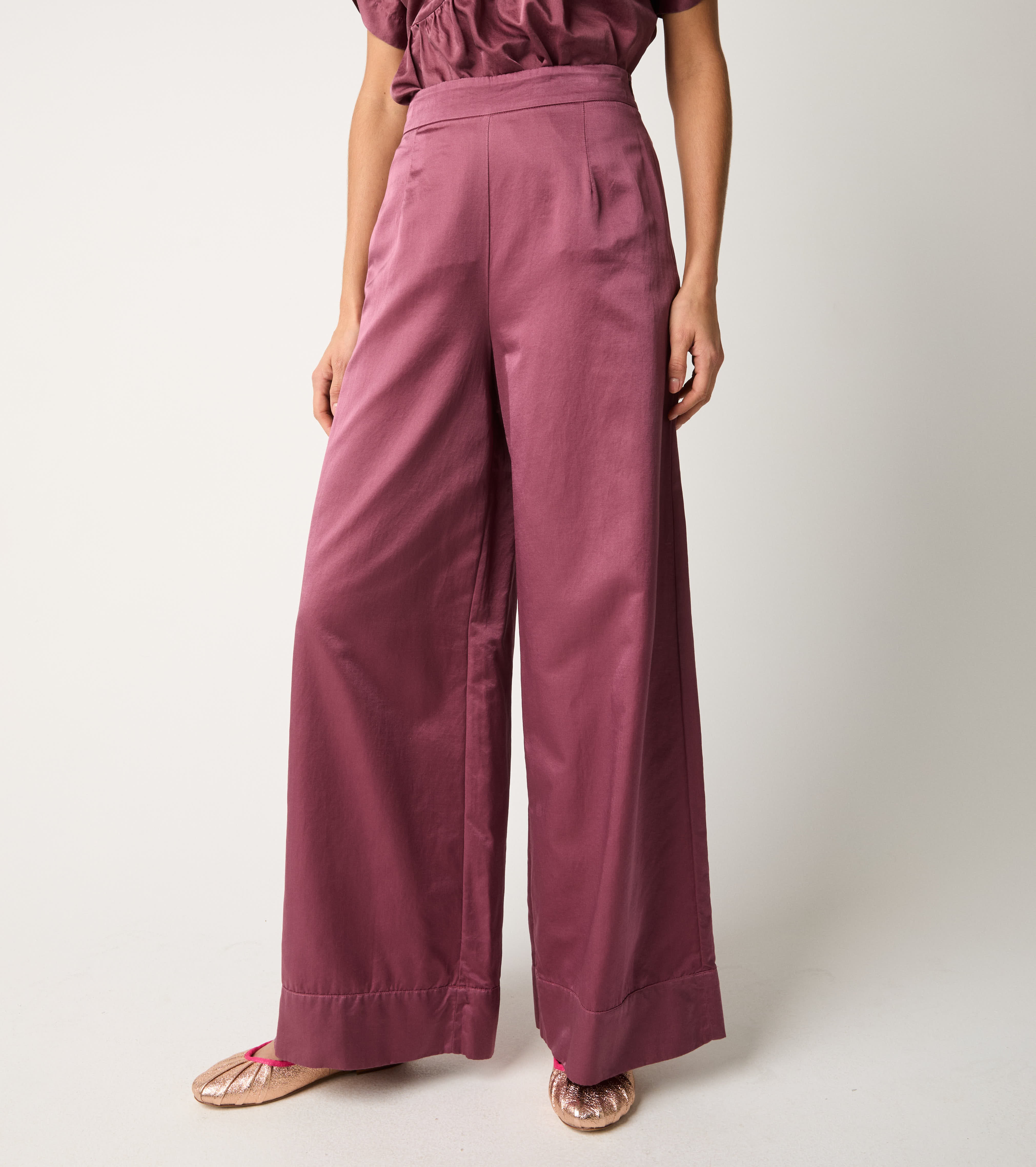 Pantaloni con piega e pinces marmellata