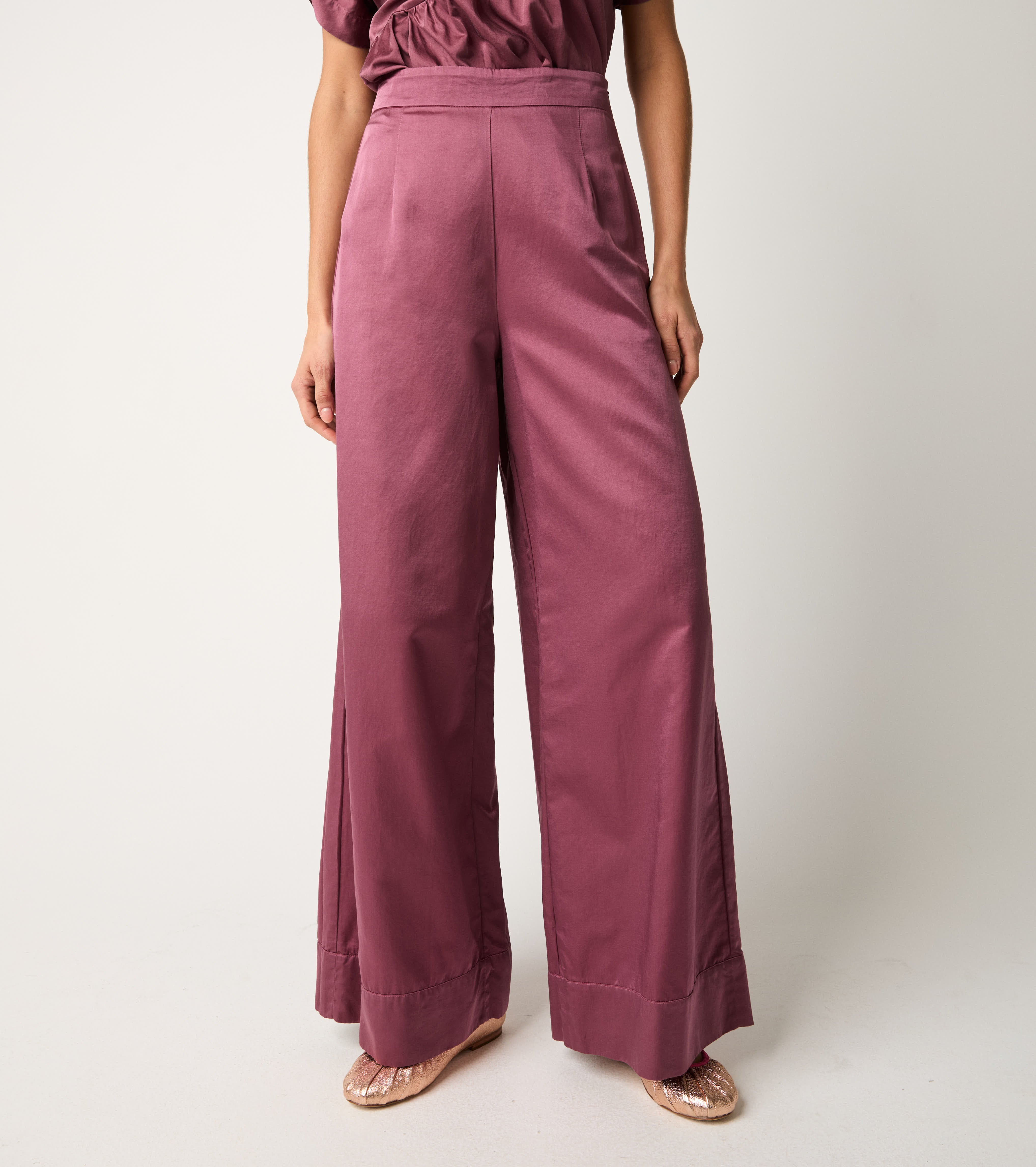 Pantaloni con piega e pinces marmellata