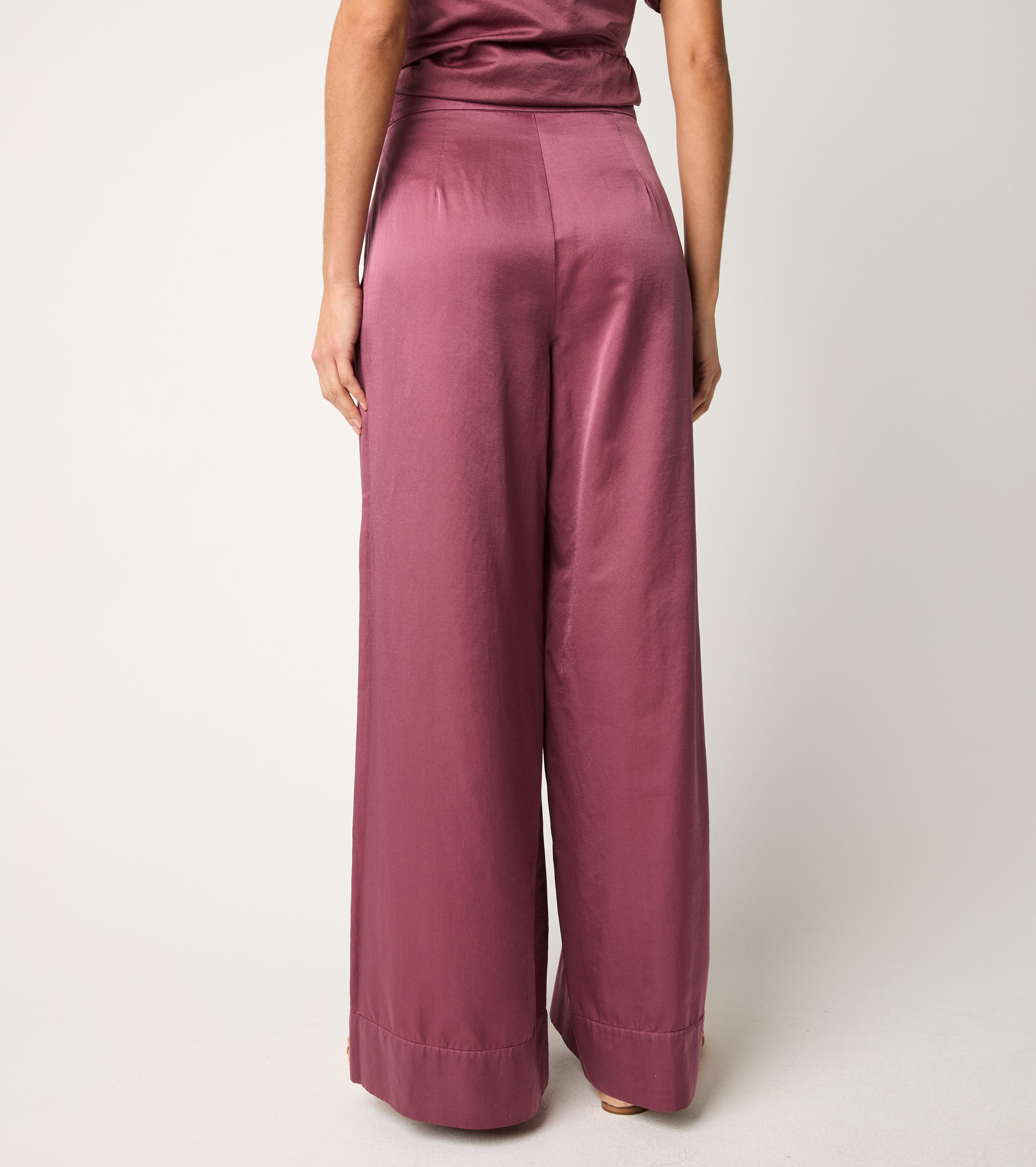 Pantaloni con piega e pinces marmellata