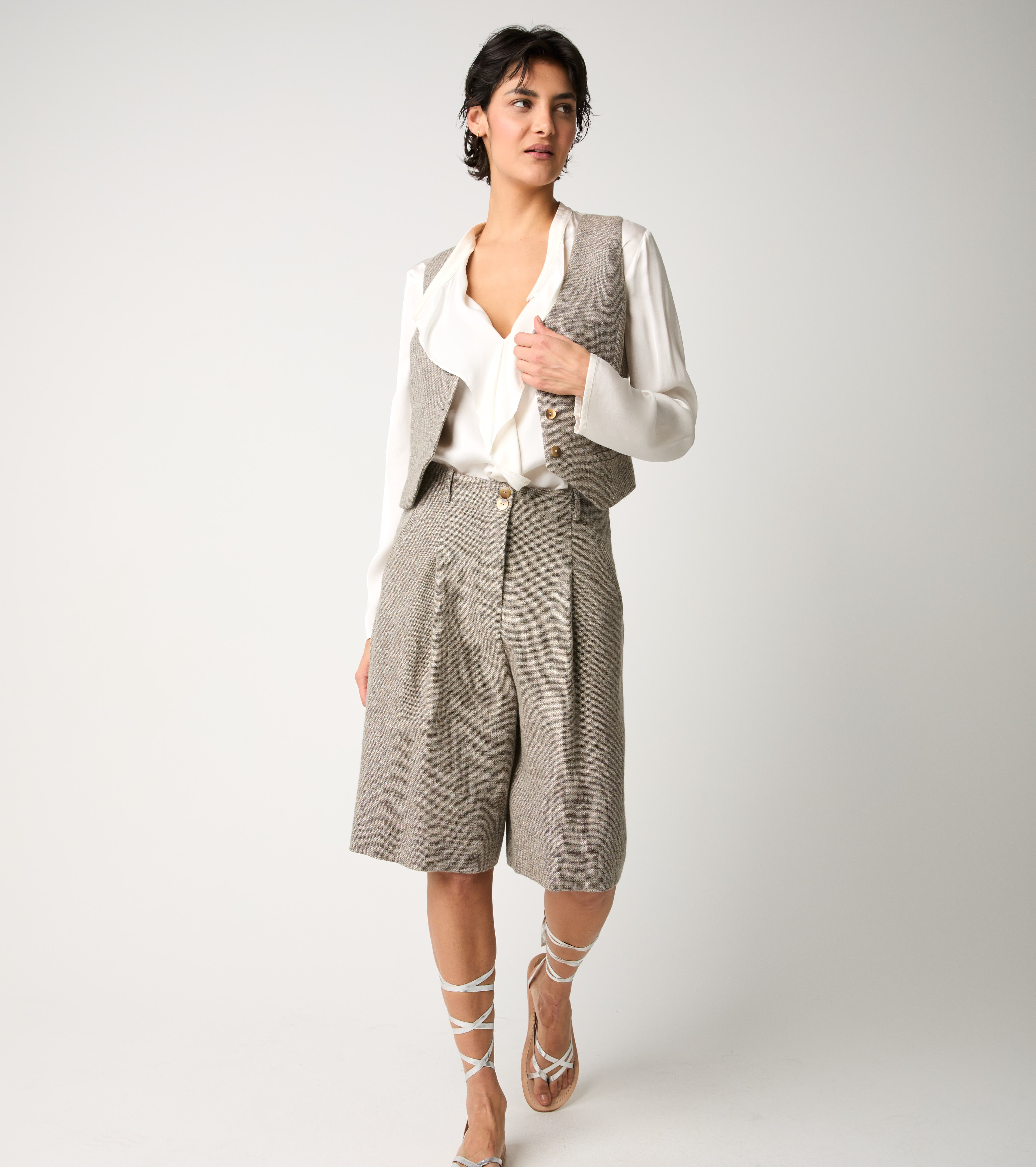 Gilet con tasche a filetto tortora