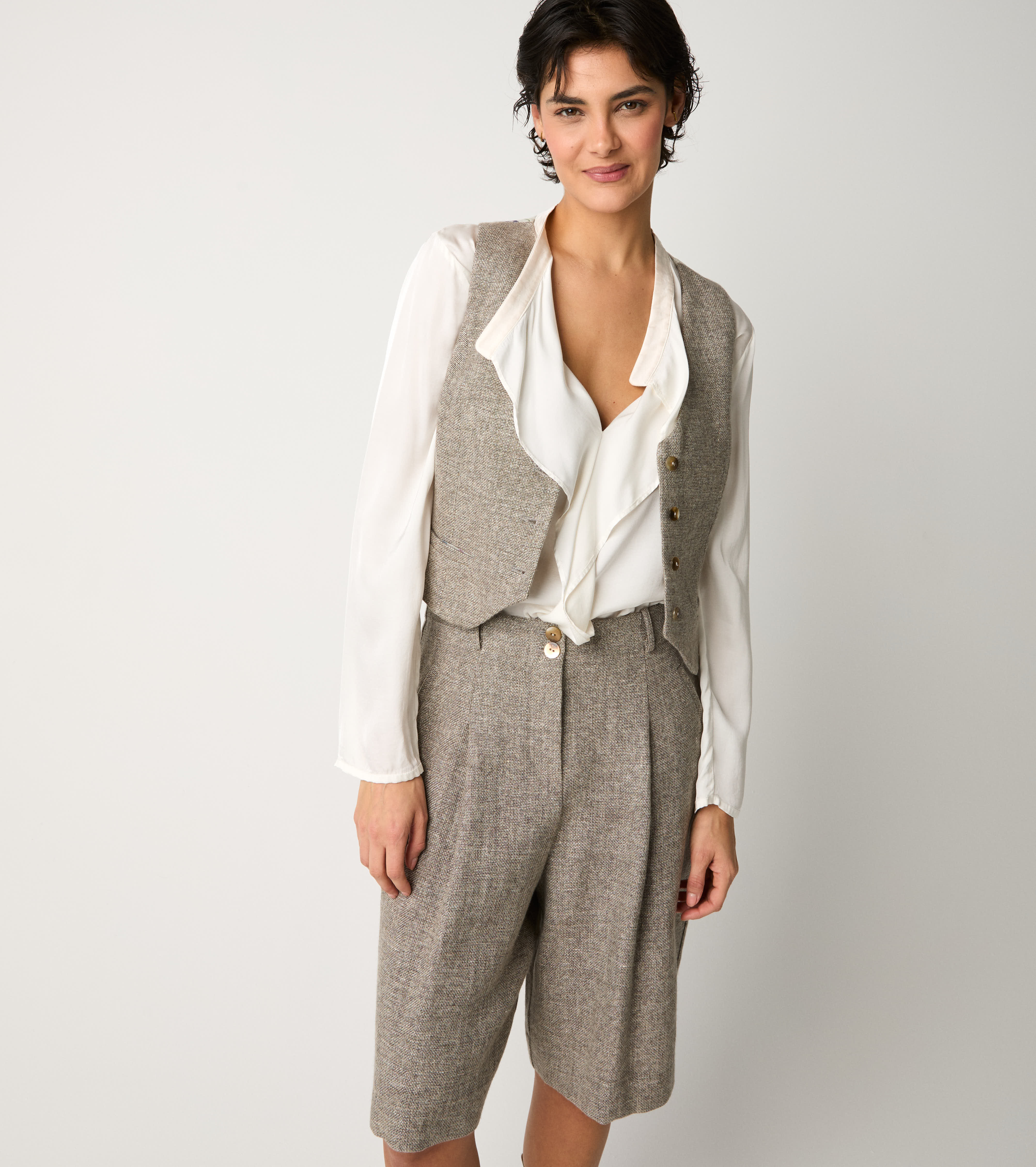 Gilet con tasche a filetto tortora