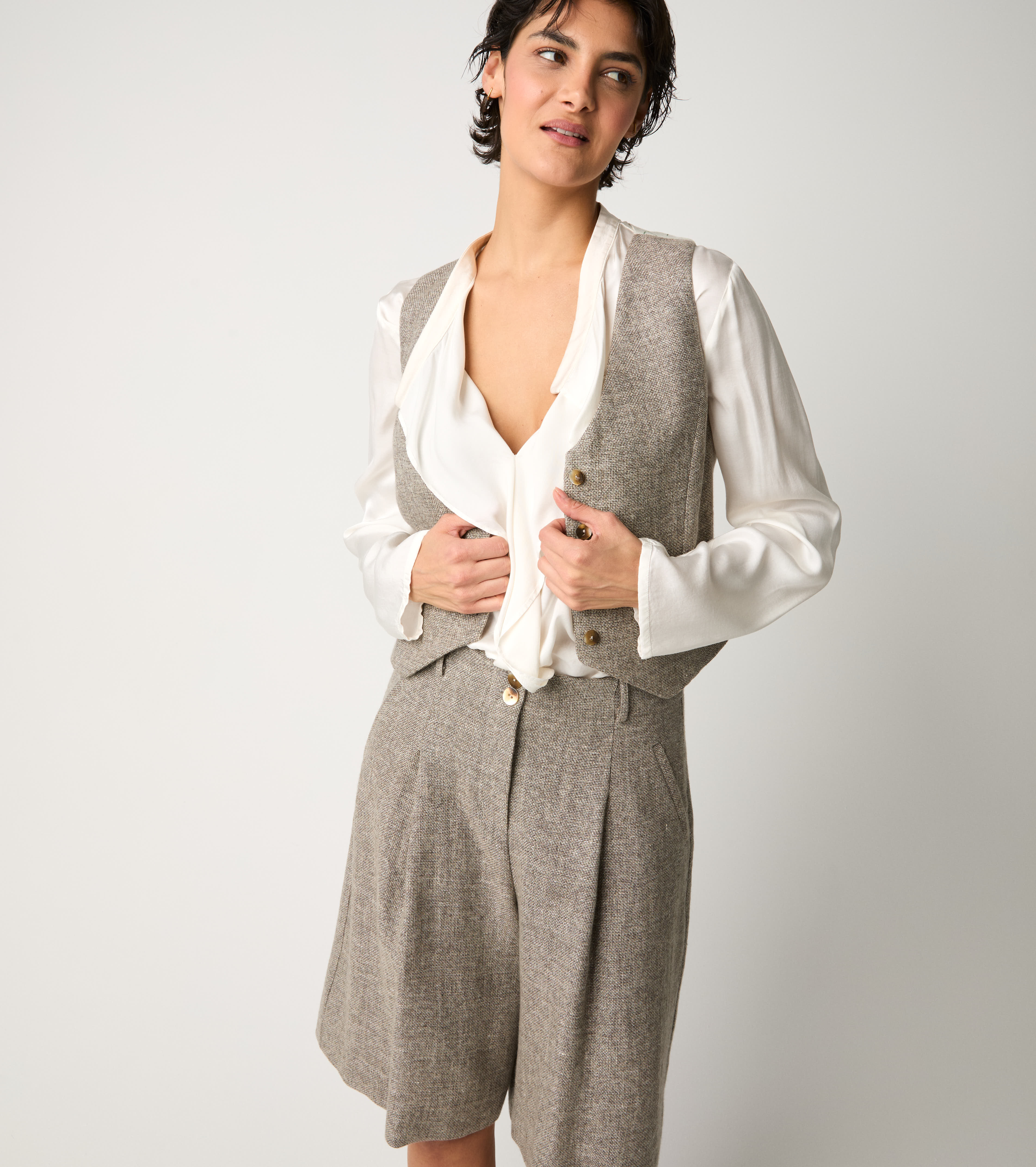 Gilet con tasche a filetto tortora