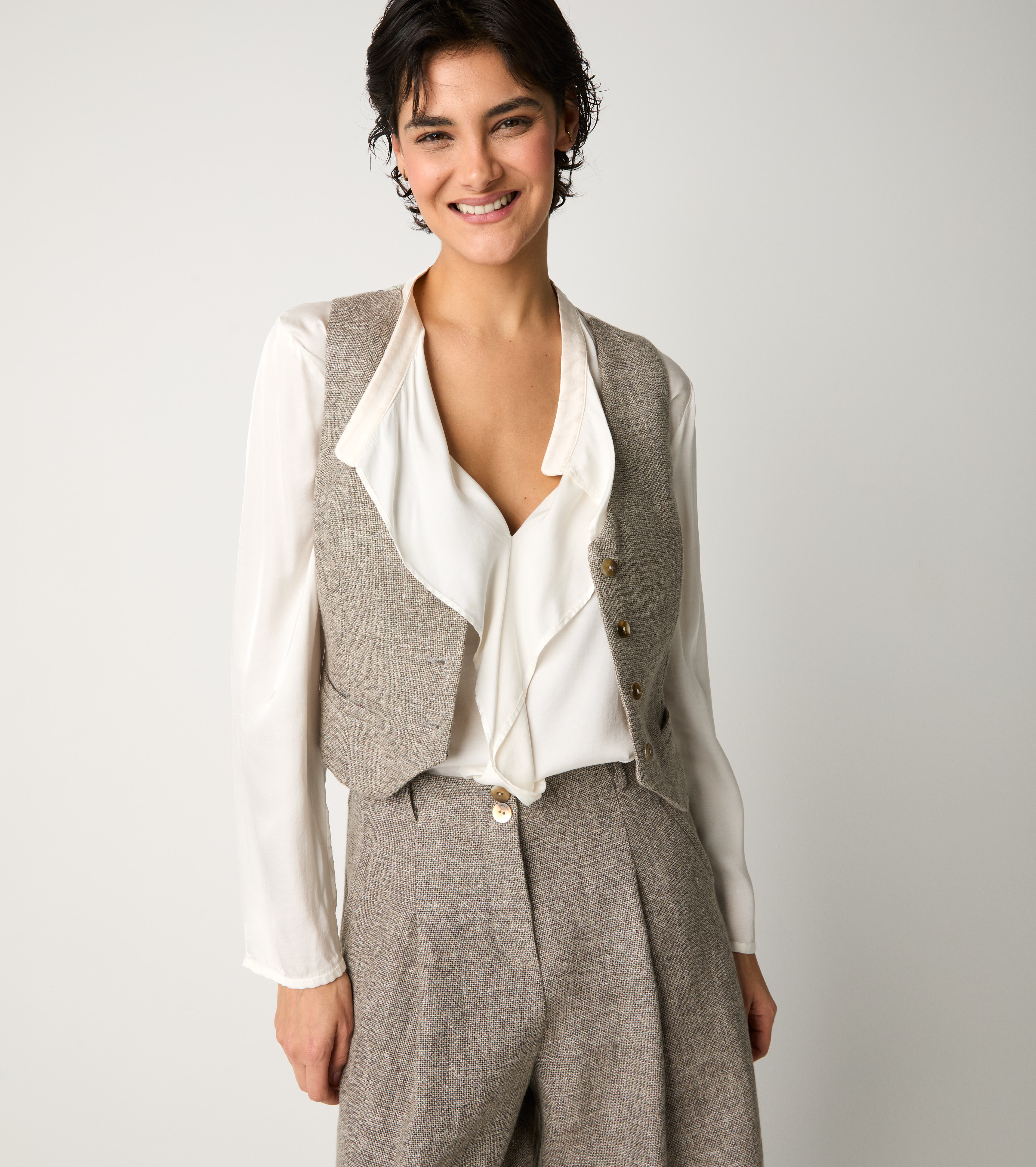 Gilet con tasche a filetto tortora