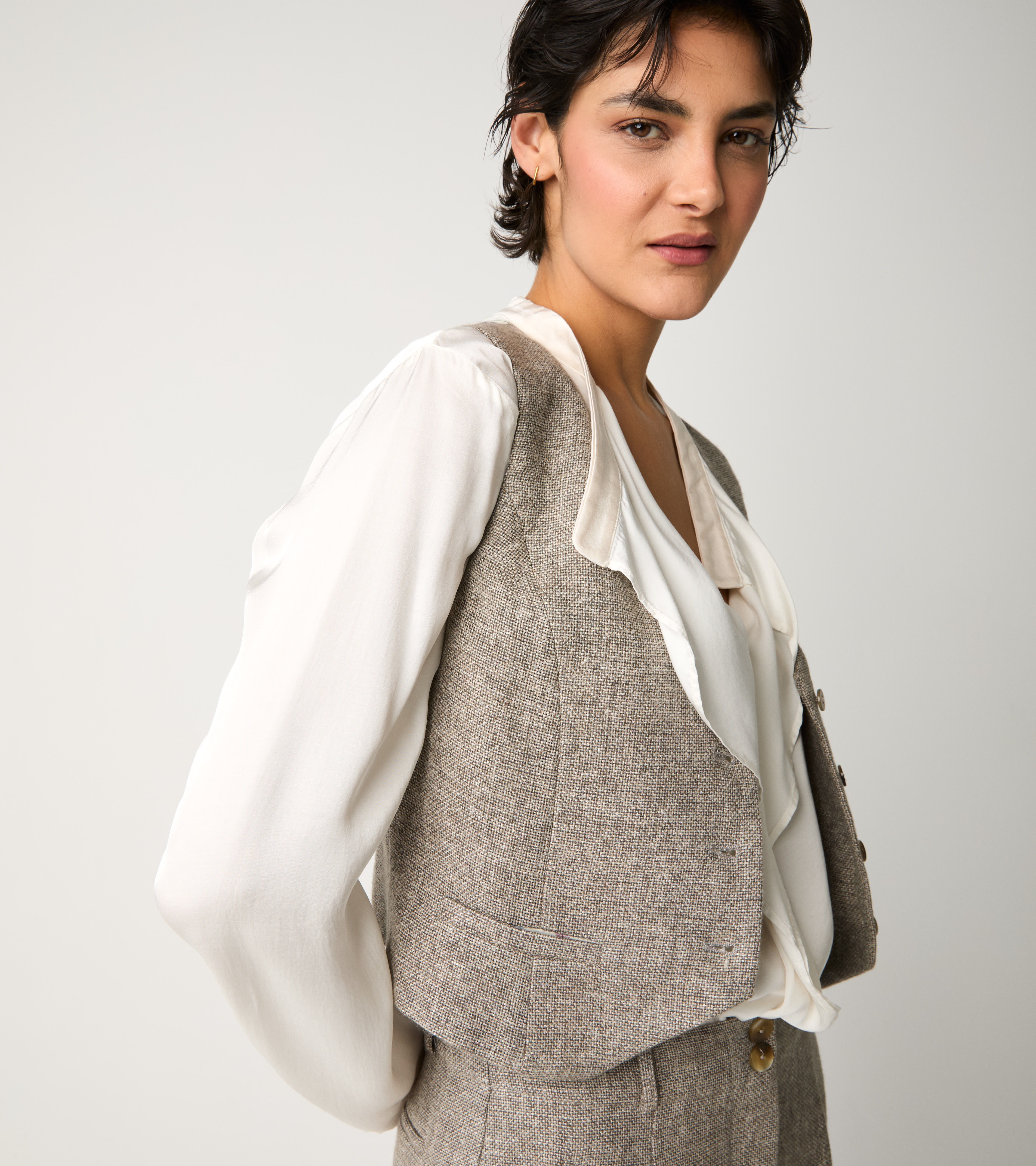 Gilet con tasche a filetto tortora