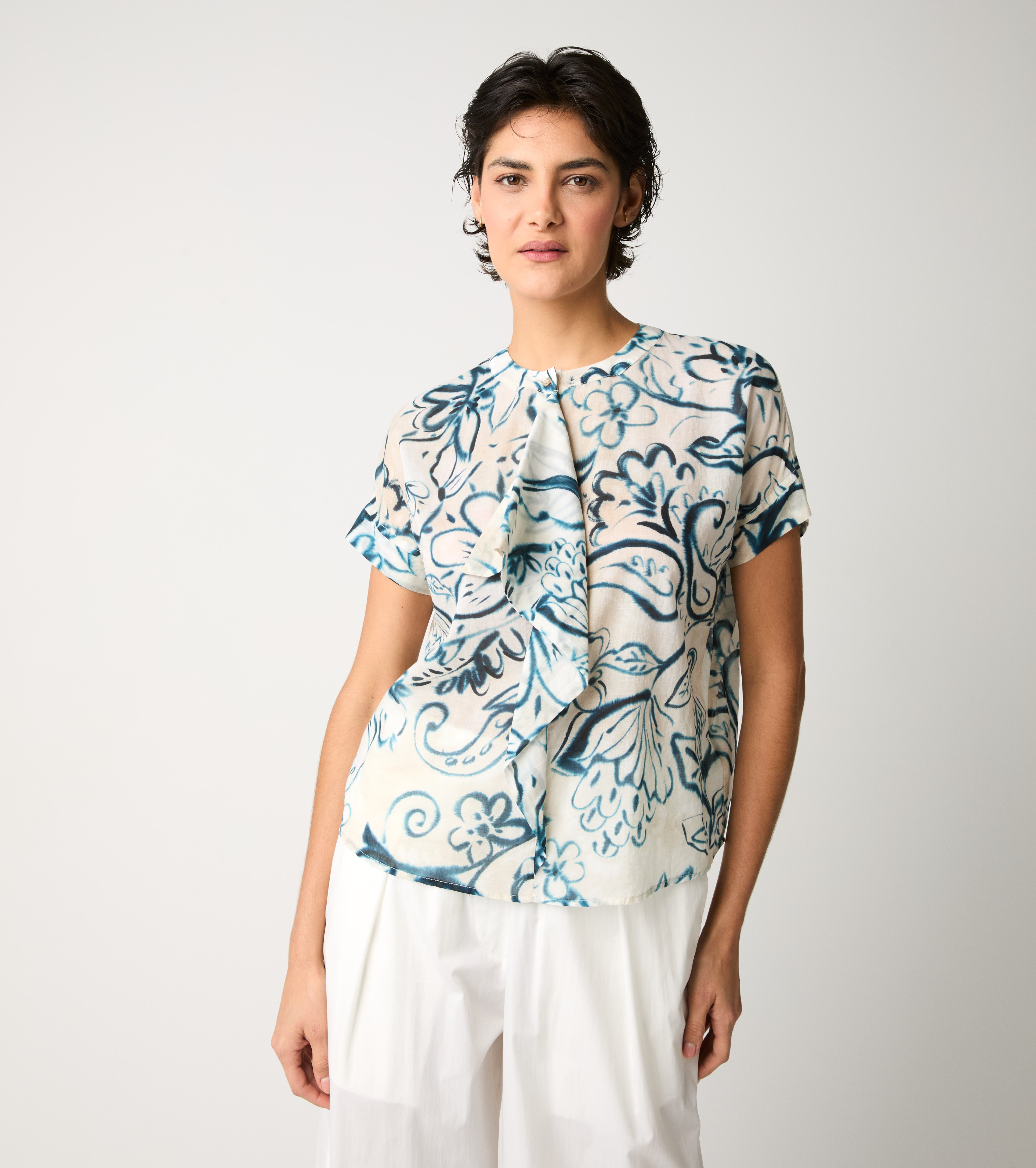 Crew-neck blouse with flower ruffles