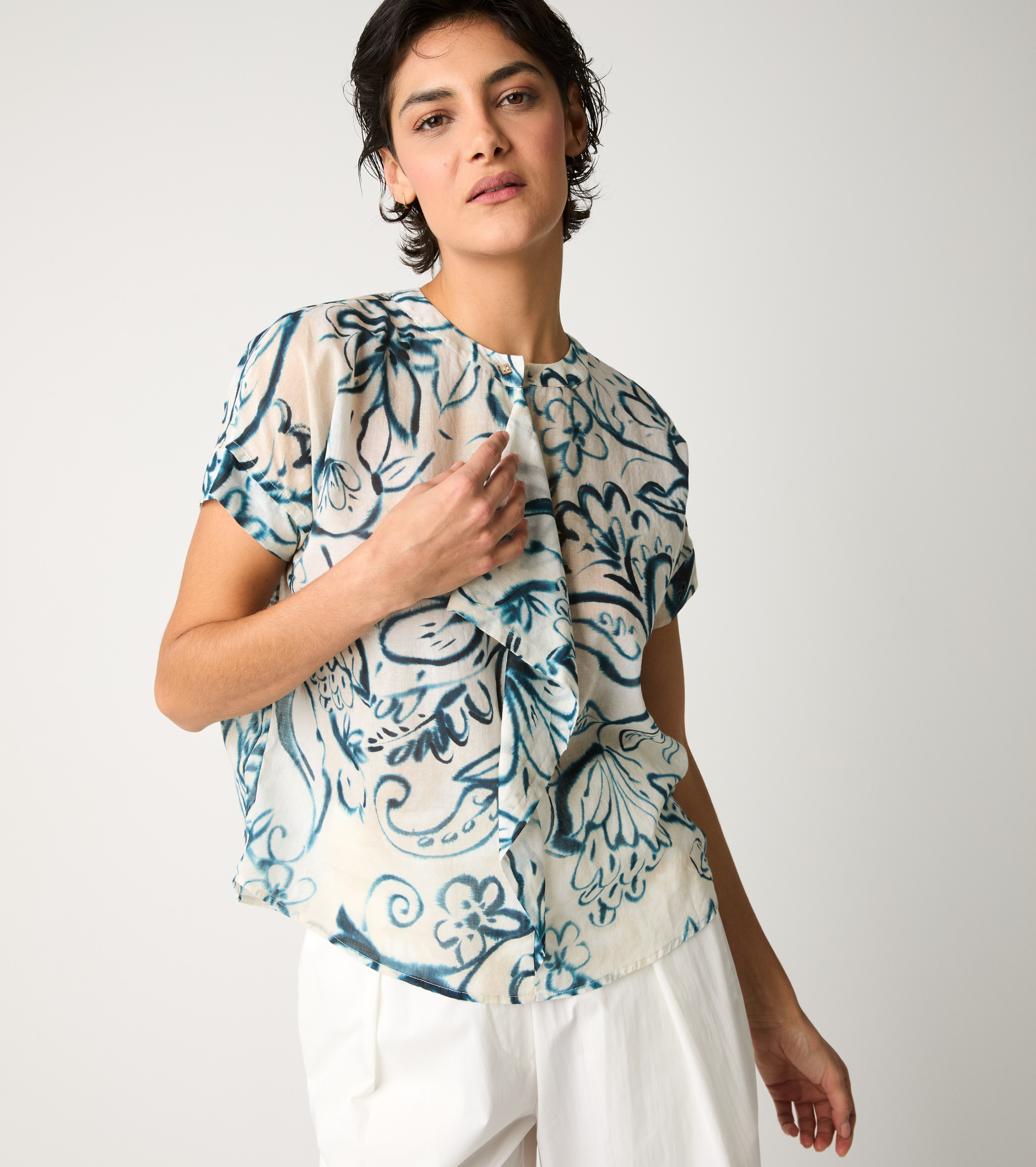 Crew-neck blouse with flower ruffles