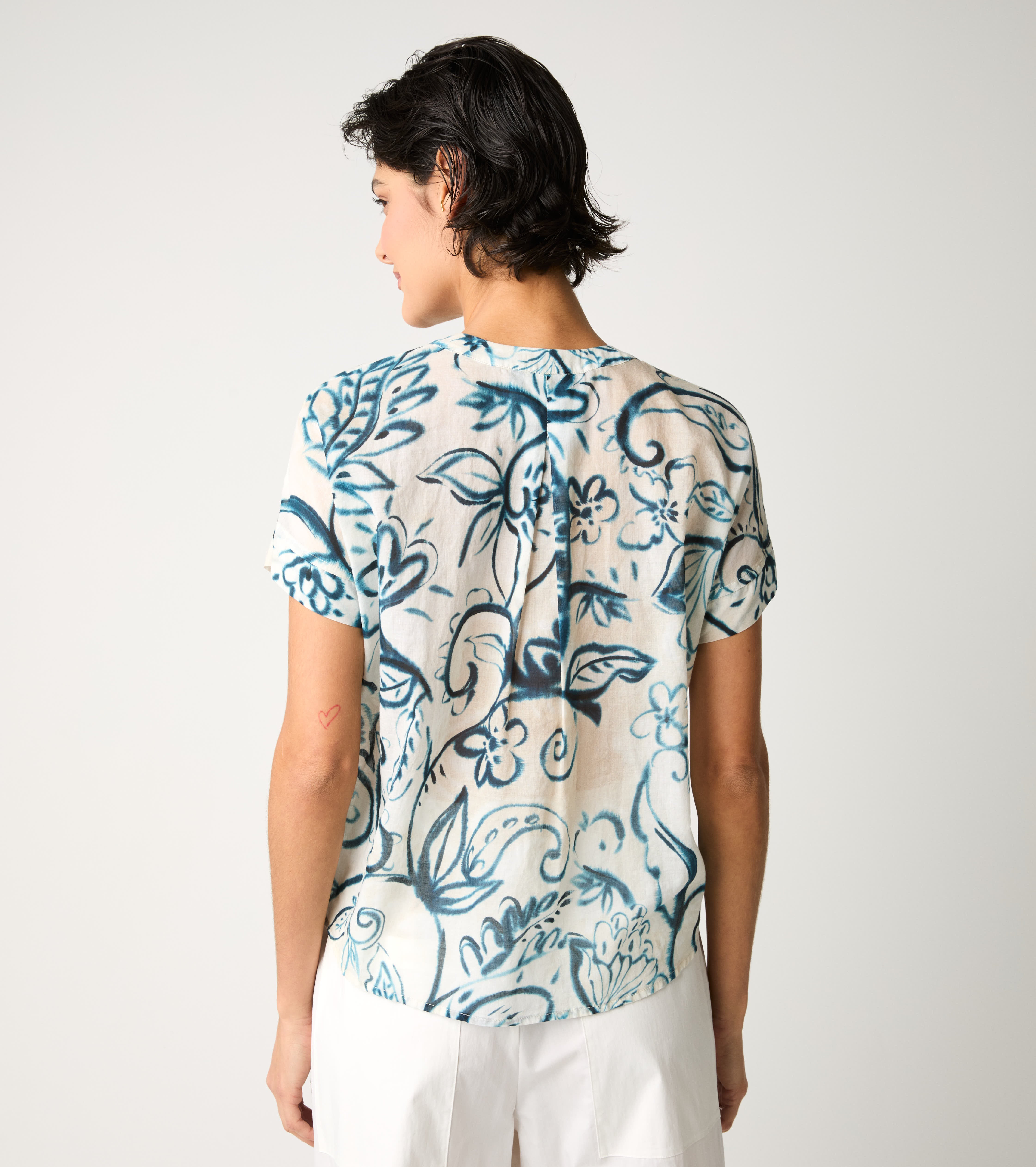 Crew-neck blouse with flower ruffles