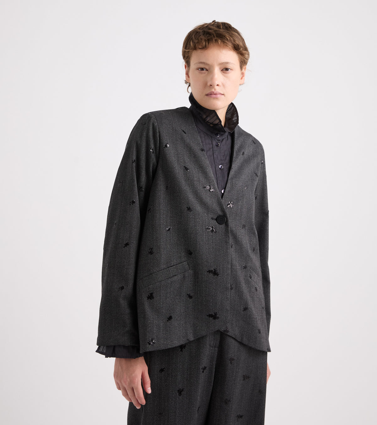 Giacca stretch con scollo a V grigiia