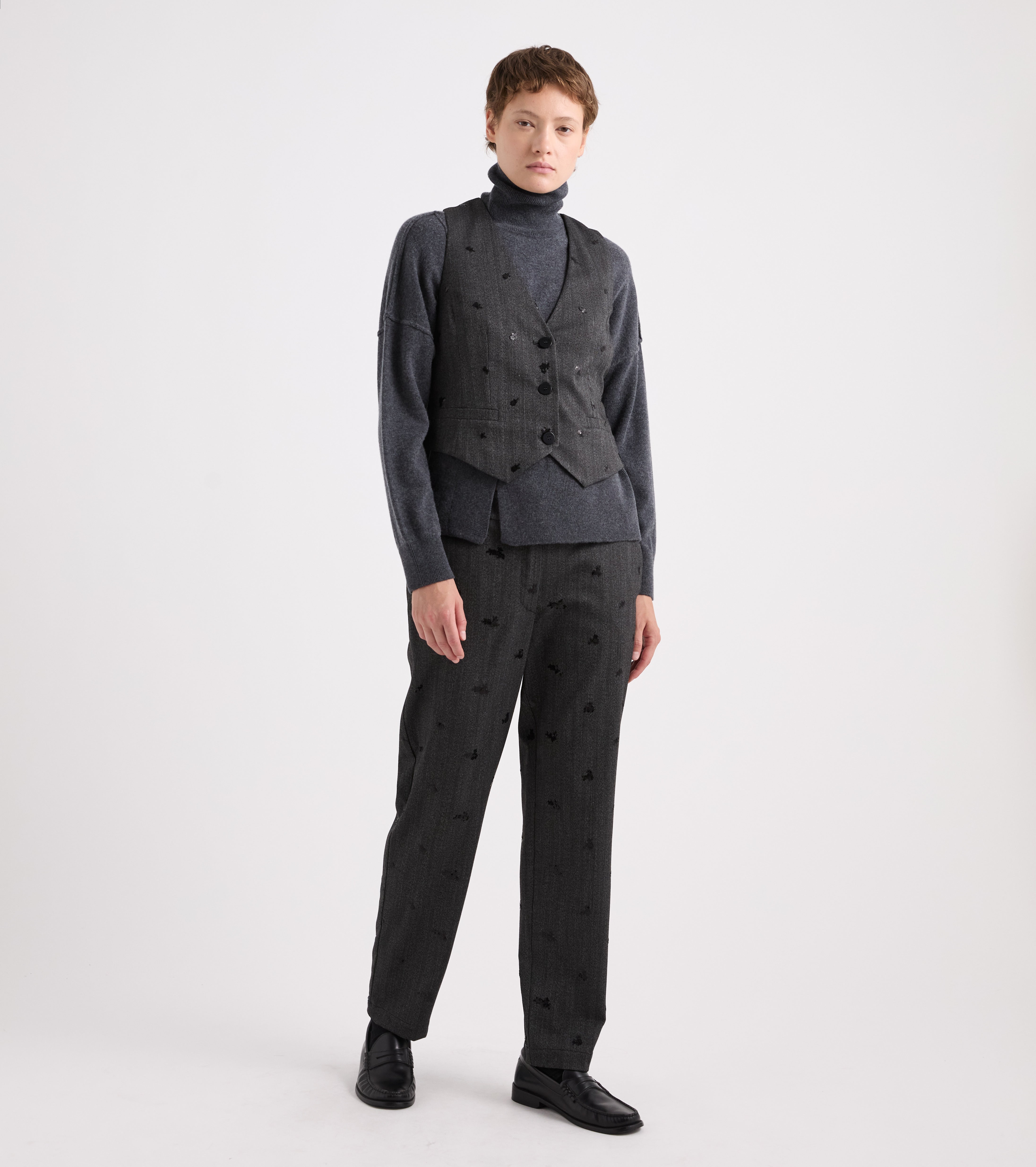 Gilet con scollo a V e ricami nero