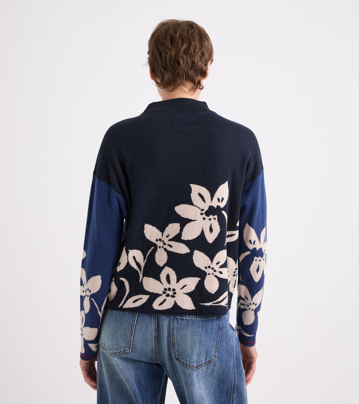 Navy and beige floral jumper with a high neck