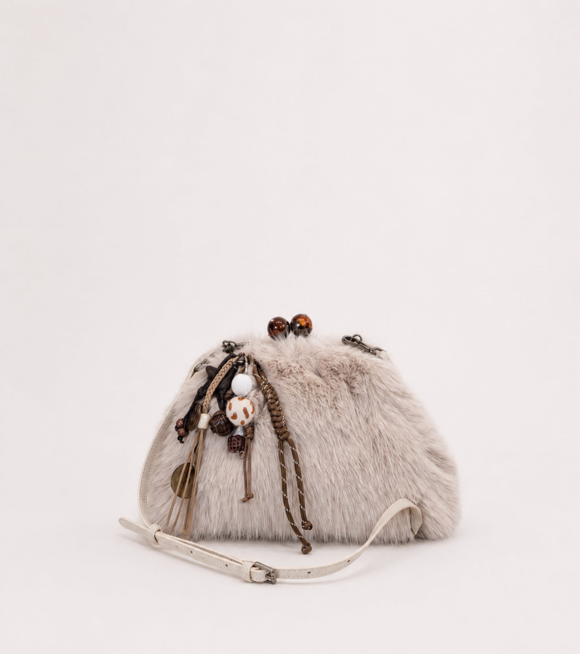 Sand-coloured crossbody bag with charms