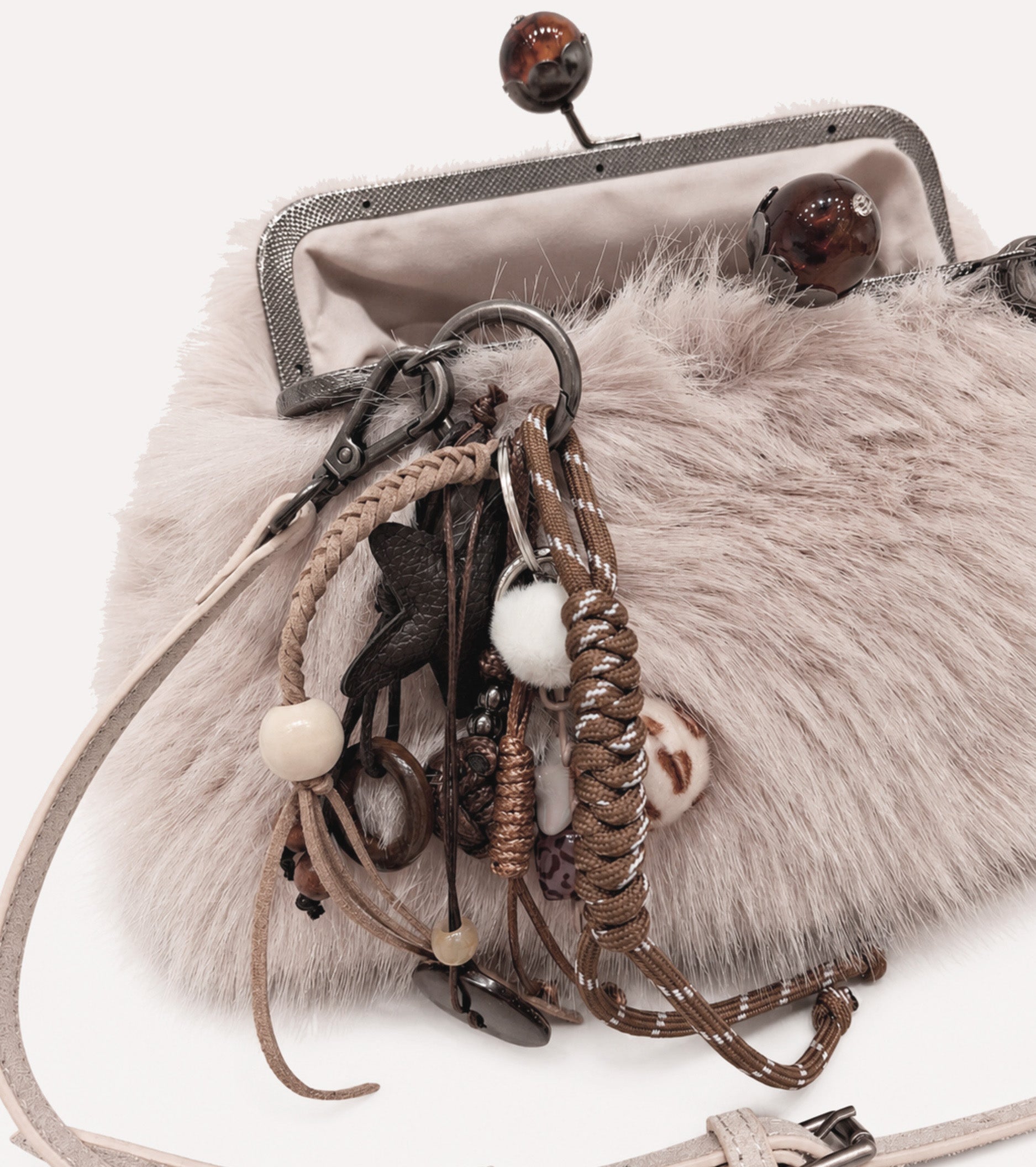 Sand-coloured crossbody bag with charms