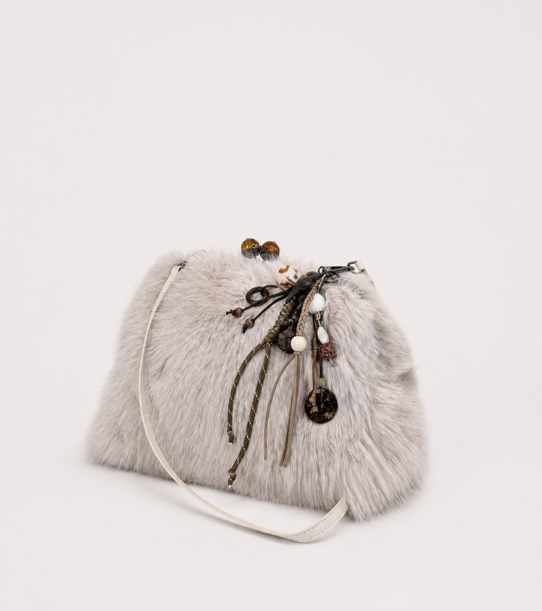 Sand-coloured crossbody bag with charms