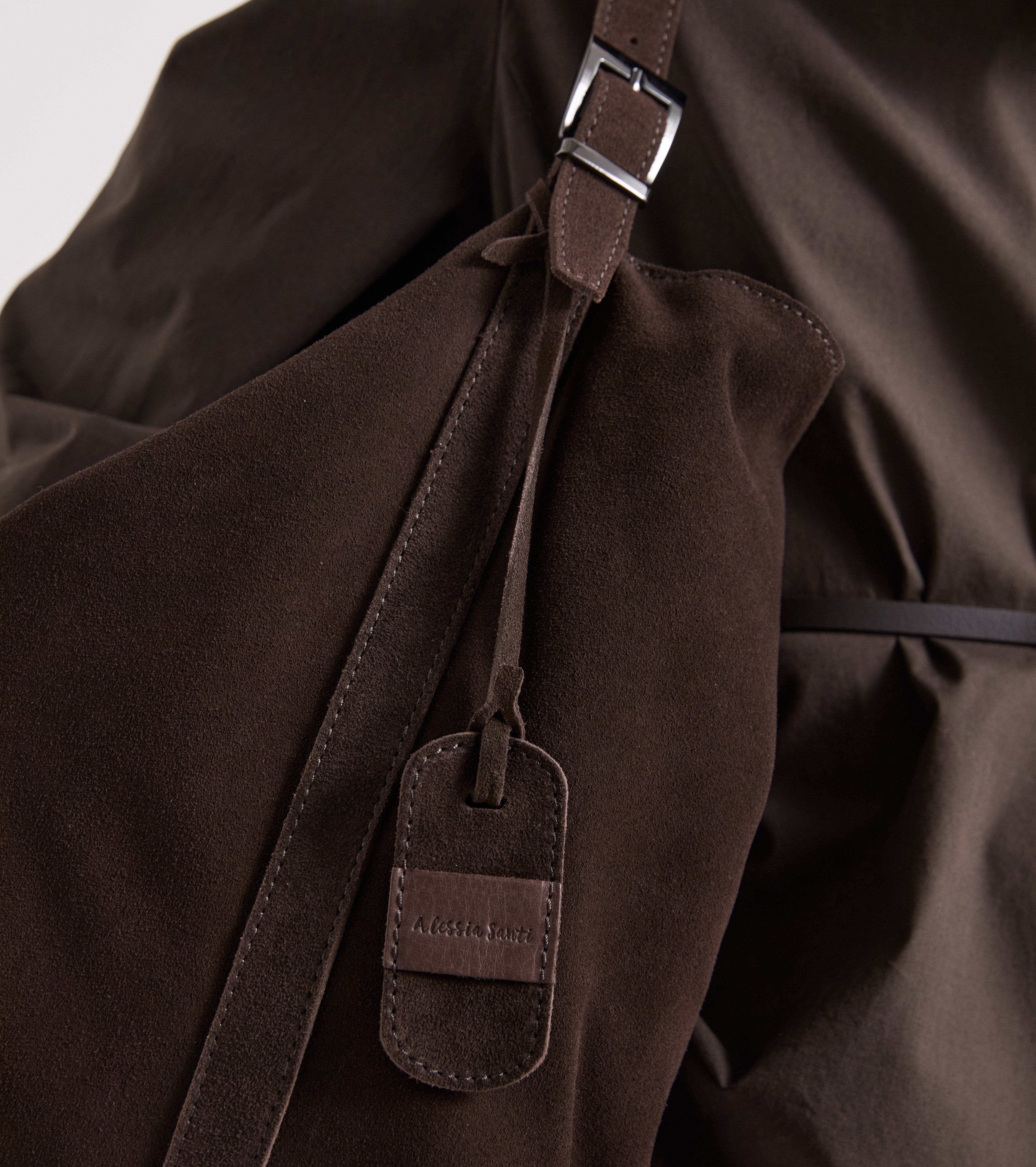 Suede shoulder bag with ebony charm