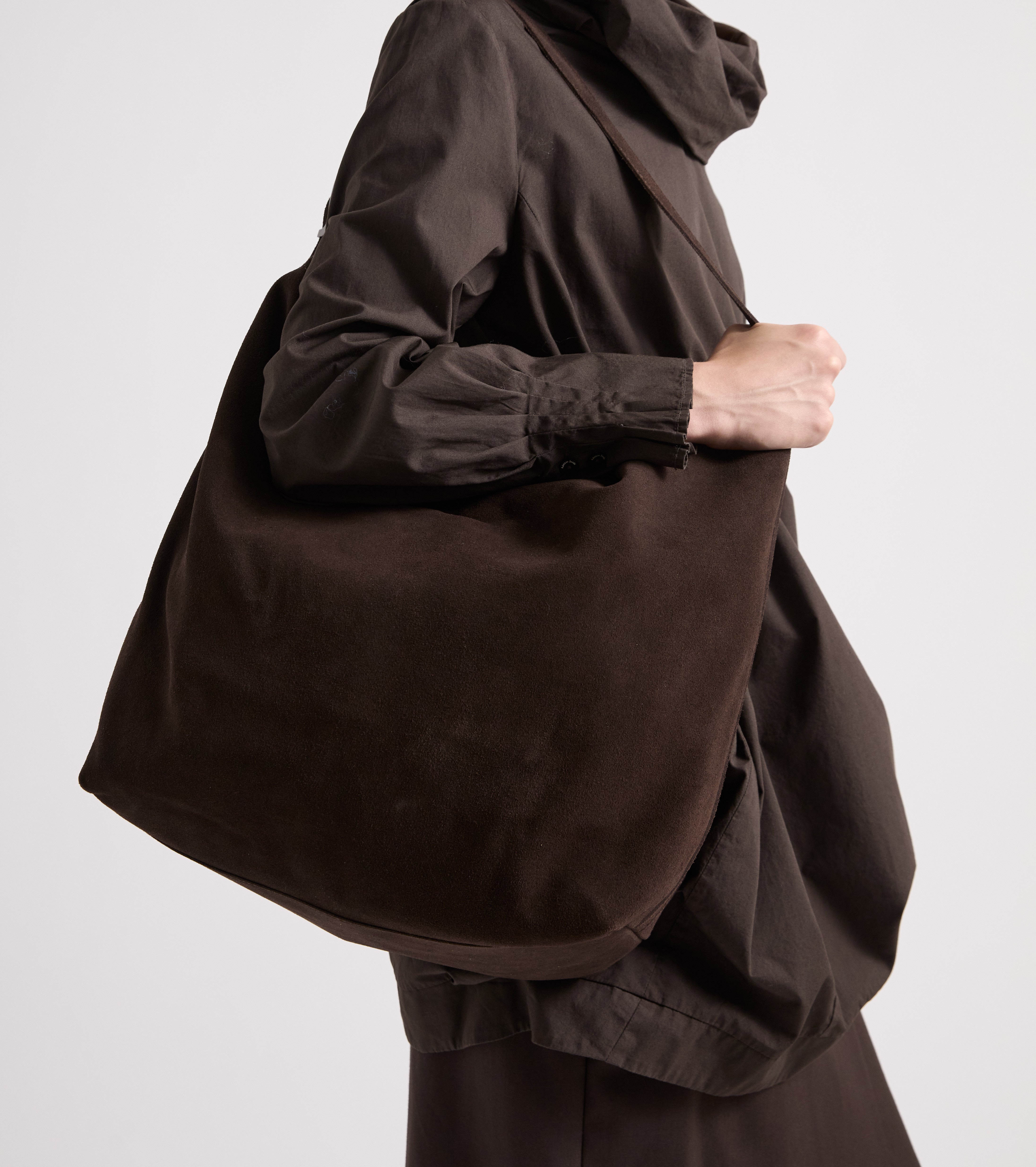 Suede shoulder bag with ebony charm