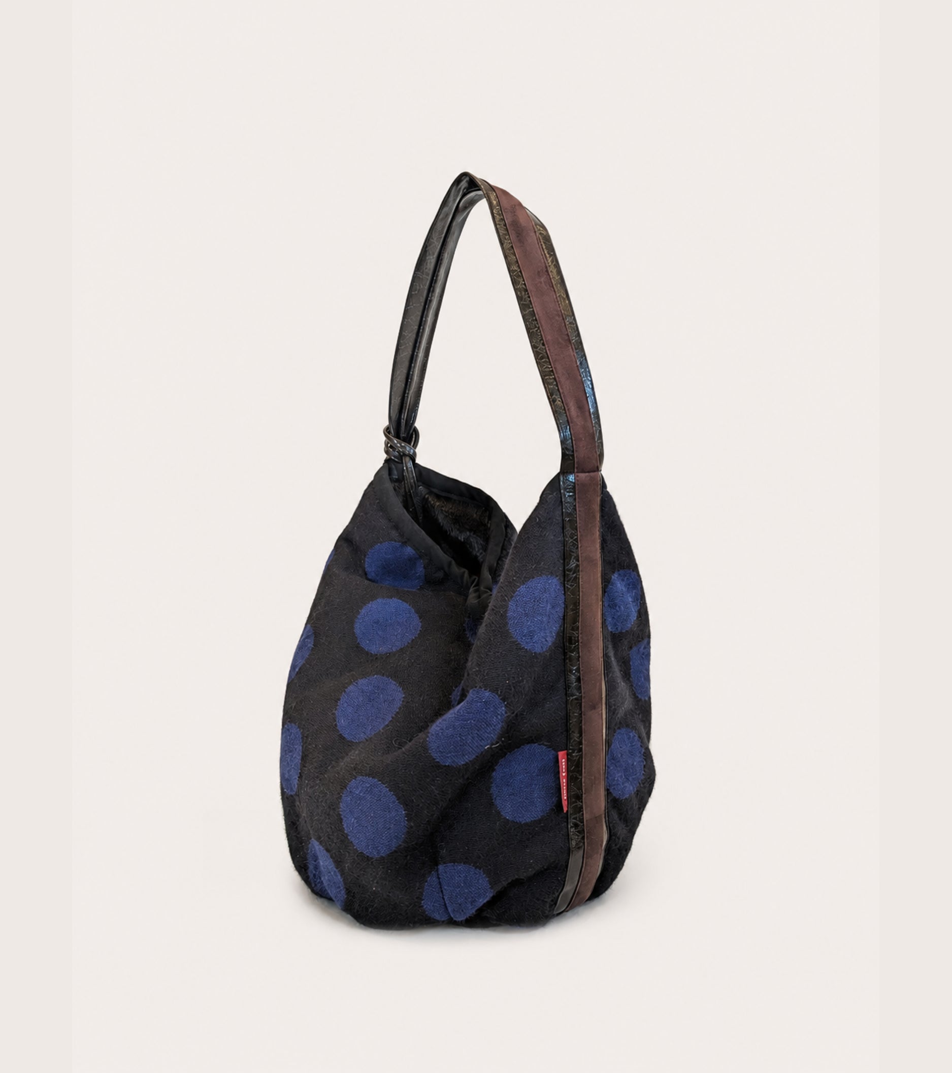Borsa a secchiello in misto alpaca jacquard nero pois